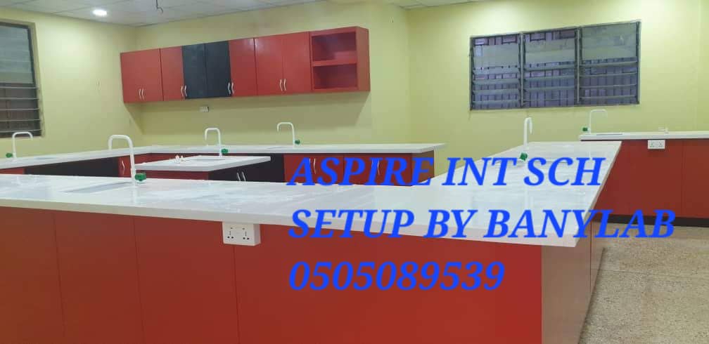 Aspire International School laboratory benches with storage cabinets and service taps