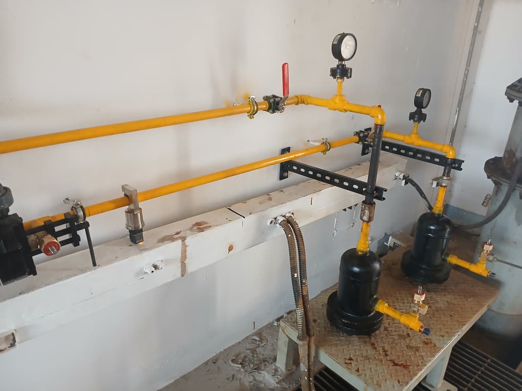 Laboratory gas line manifold with pressure gauges and shutoff valves